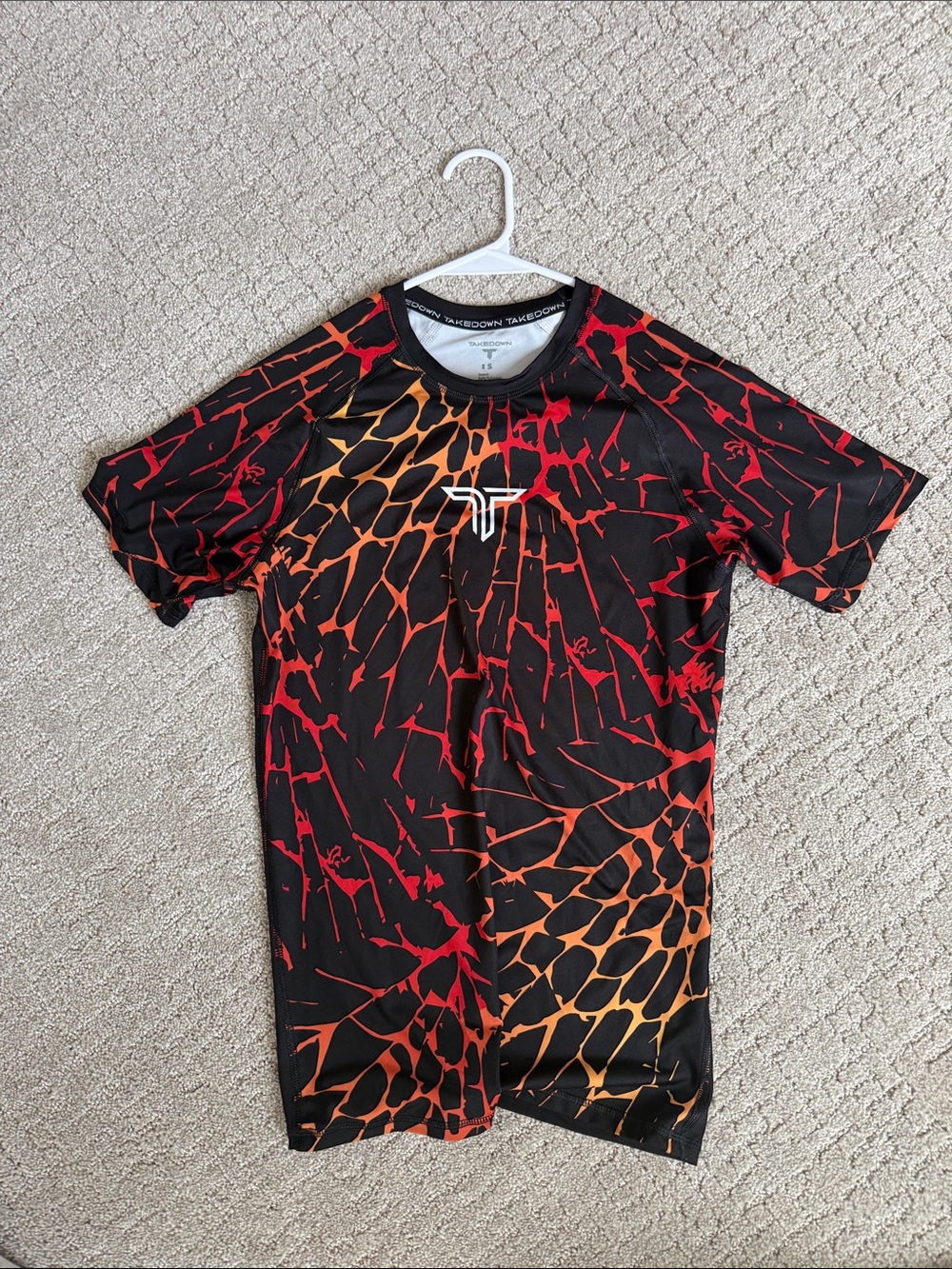 Active Short Sleeve Top in Black with Red-Orange Print